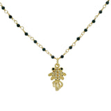 Collier doré onyx noire poisson zircons blancs et noirs 44cm
