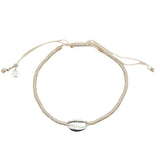 Cream cord bracelet and 925 silver cowrie shell