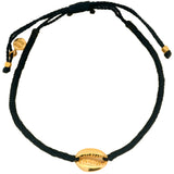 Navy blue cord bracelet and gold cowrie