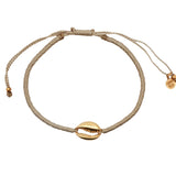 Golden cowrie cord bracelet