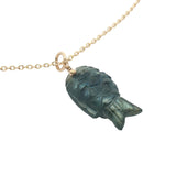 Gold necklace and natural stone fish
