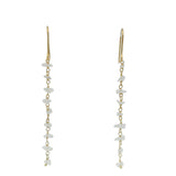 Boucles d'oreilles dorées avec pierre de Lune taillée en brut