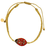 Gold braided cord bracelet and ladybug