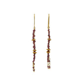 Golden hanging earrings with stones
