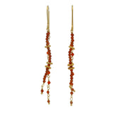 Boucles d'oreilles dorées pendantes onyx rouge et couronnes dorées