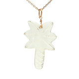 Gold necklace and natural stone palm tree