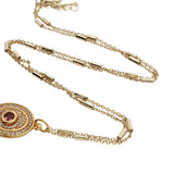Collier doré clé tourmaline rose zircons 50 cm
