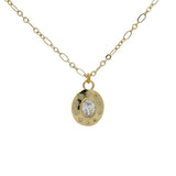 Collier doré médaille ovale et zircons 50cm