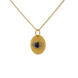 Collier doré médaille oeil lapis et zircons 42 cm