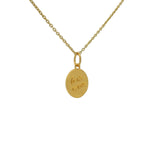 Gold necklace with “life in pink” medal