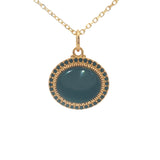 Collier doré médaillon onyx noire ovale et zircons 42 cm