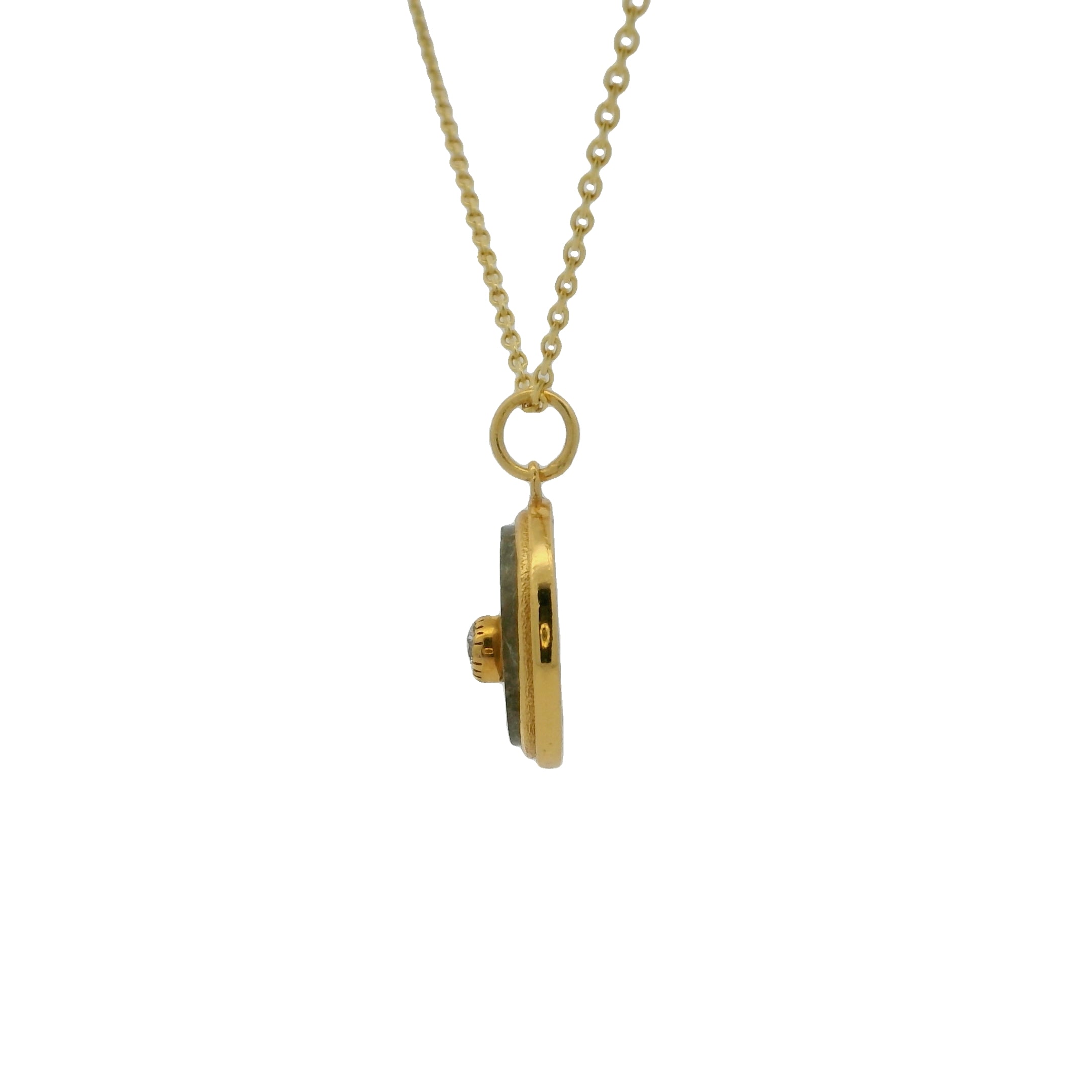 Gold necklace with stone and zircon medal "every day more" on the back