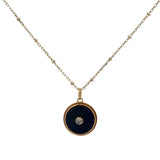 Gold necklace with stone and zircon medal "every day more" on the back