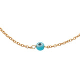Bracelet doré petit oeil rond bleu