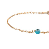 Bracelet doré petit oeil rond bleu