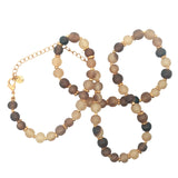 Horn pearl and gold disc necklace