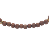 Light wood bead necklace and gold discs