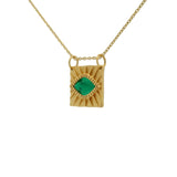 Gold necklace with textured square pendant and stone eye