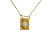Gold necklace with textured square pendant and stone eye