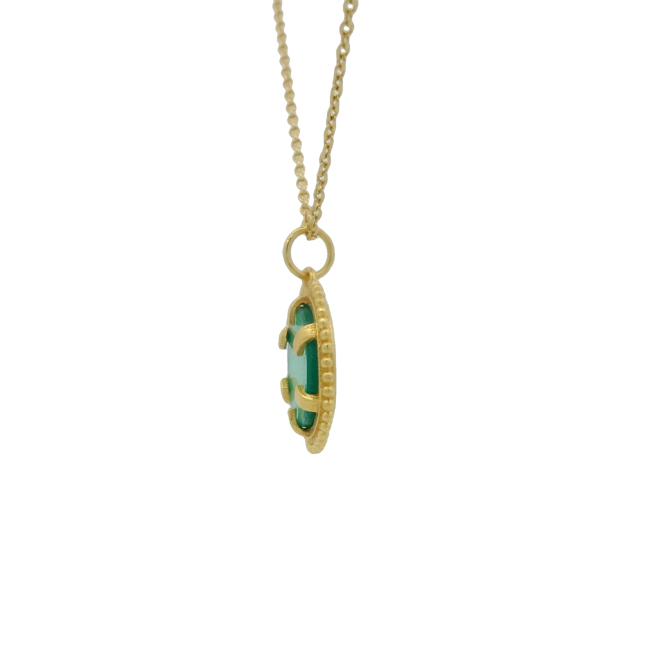Gold necklace with oval stone pendant and balls