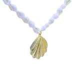 Collier doré coquillage et zircons 80 cm