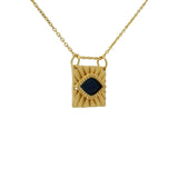 Gold necklace with textured square pendant and stone eye