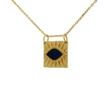 Gold necklace with textured square pendant and stone eye