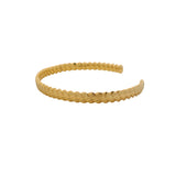 Fine twisted and hammered gold rush