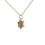 Gold necklace and natural stone flower