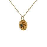 Gold necklace with star and stone medal