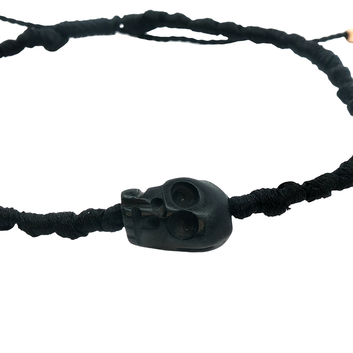 Bracelet doré cordon tête de mort noire