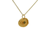 Gold necklace with hammered eye and stone pendant