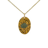 Gold necklace with hammered pendant and flat stone