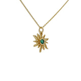 Golden necklace with sun and stone pendant