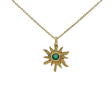 Golden necklace with sun and stone pendant