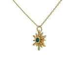 Golden necklace with sun and stone pendant