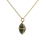 Gold necklace with gold cage stone pendant