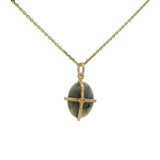 Gold necklace with gold cage stone pendant