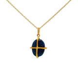 Gold necklace with gold cage stone pendant