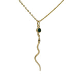 Gold necklace with snake and stone pendant