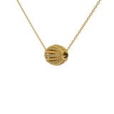 Gold necklace with zircon seed pendant