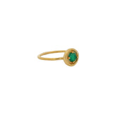 Hammered gold ring with small round stone
