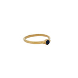 Thin gold ring with small stone