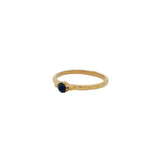 Thin gold ring with small stone