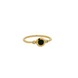 Thin ring with round stone and zircons