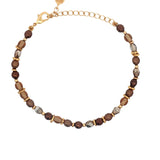 Bracelet with natural stones and golden discs