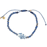 Bracelet cordon tressé bleu et doré poisson blanc et bleu