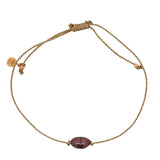 Bracelet doré avec perle de culture grise