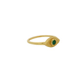 Gold ring with hammered eye and stone