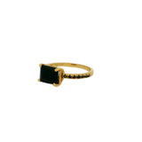 Solitaire gold ring with stone and zircons